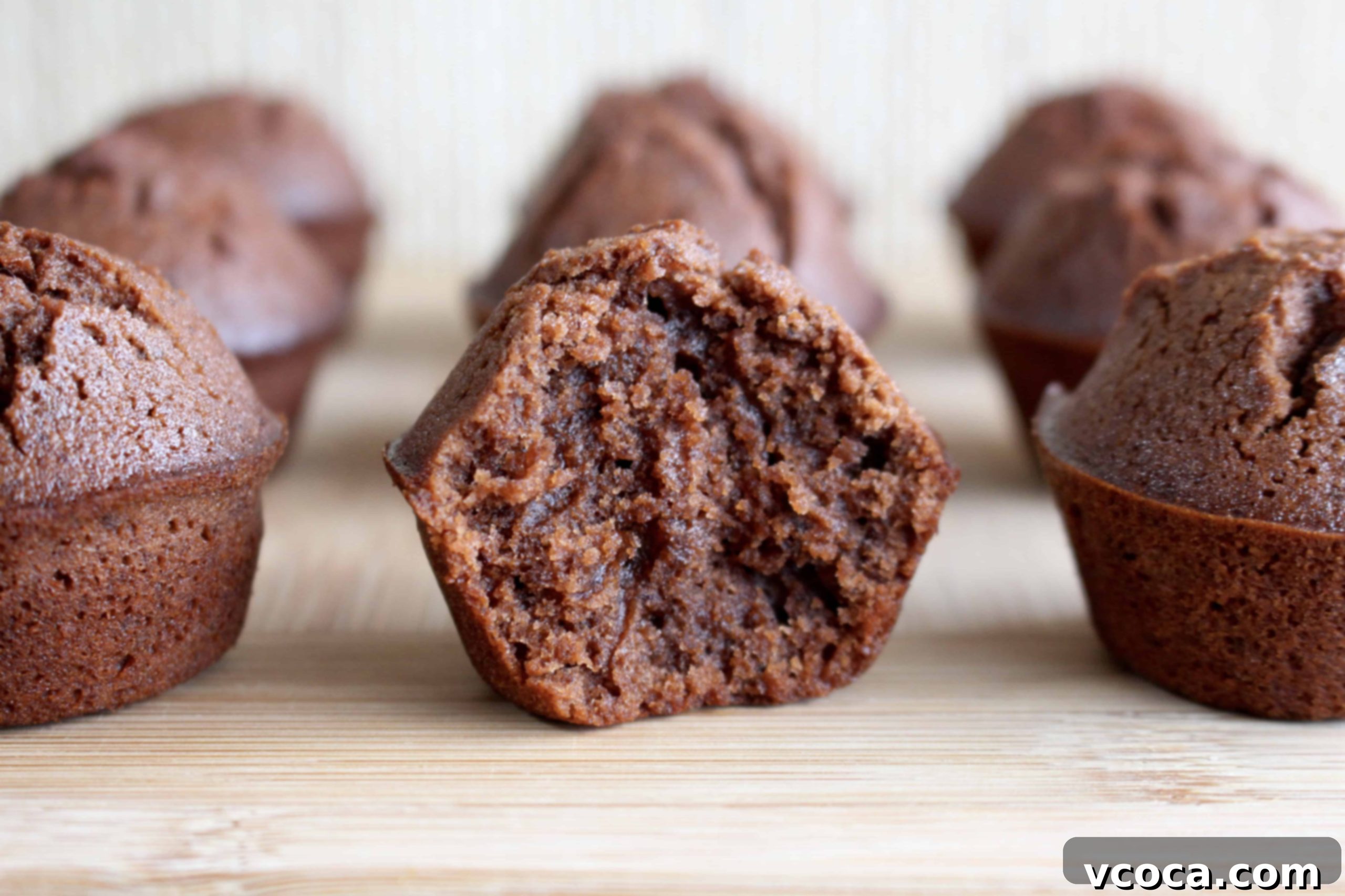 Decadent Chocolate Hazelnut Financiers 8 A stack of delicious chocolate hazelnut financiers, perfect for a fall treat.