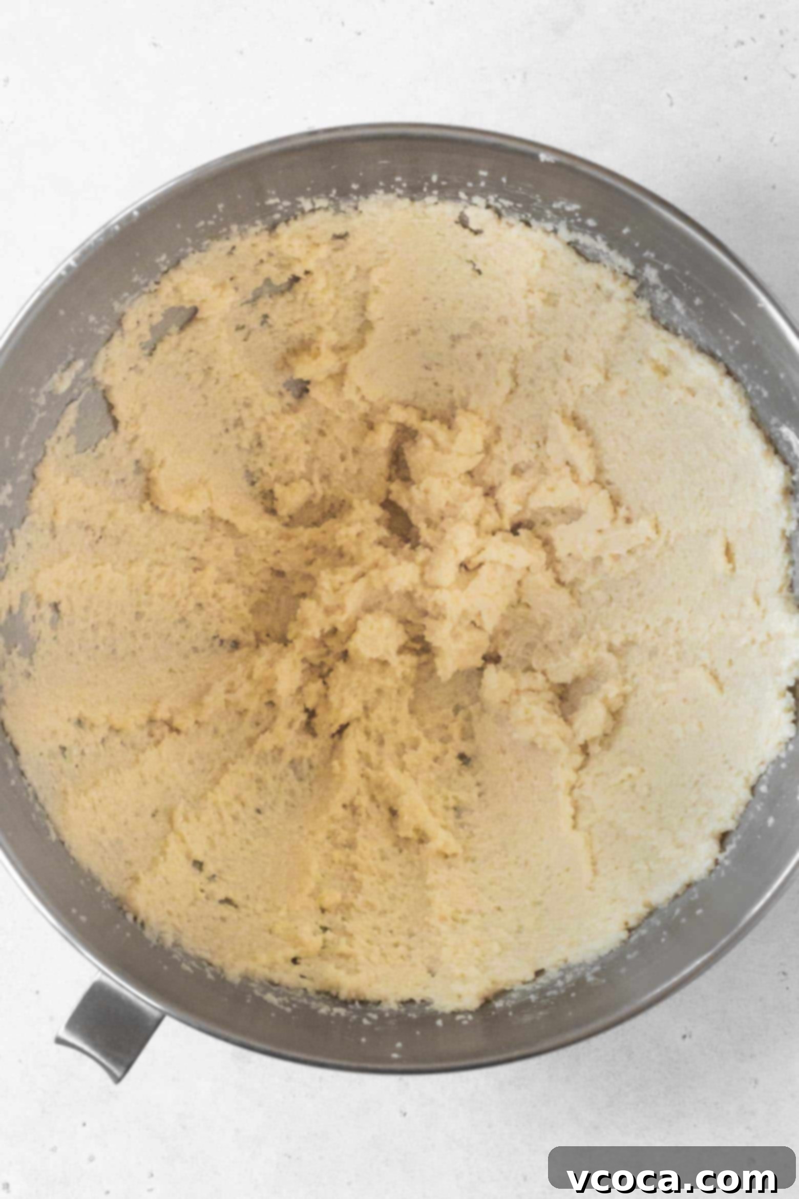 Indulgent Gluten-Free Pound Cake 8 Beating butter, shortening, and granulated sugar in a stand mixer until light and fluffy.
