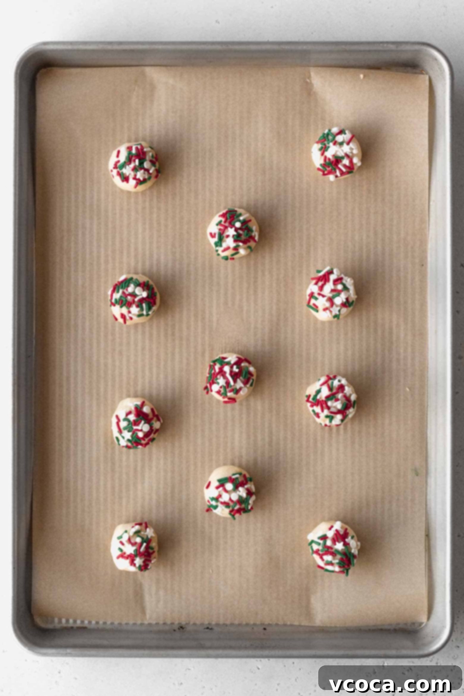 Irresistible Gluten-Free Christmas Treats 17 Put sprinkles on balls of cookie dough and place them on a baking sheet.