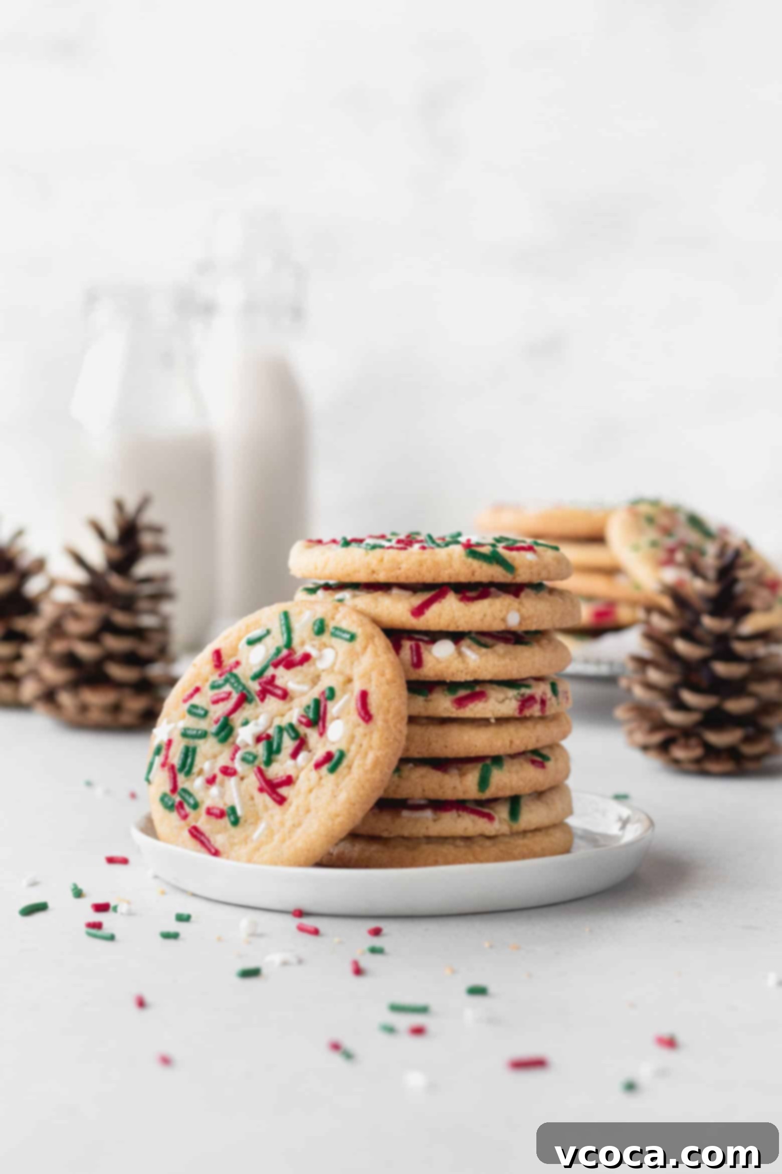 Irresistible Gluten-Free Christmas Treats 19 A stack of gluten free Christmas cookies on a white dessert plate.