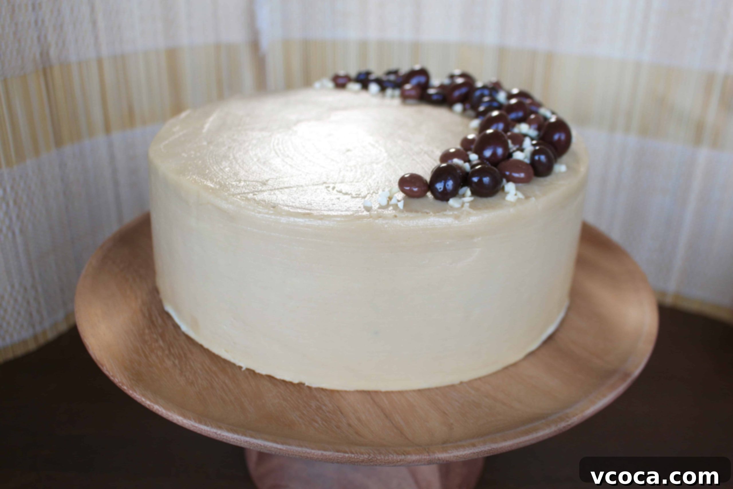Decadent Mocha Chocolate Cake 7 Chocolate Mocha Cake decorated with chocolate-covered coffee beans and crushed almonds